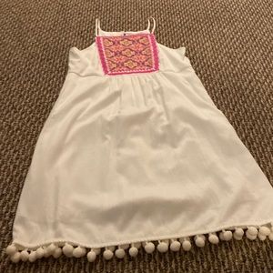 white dress with a pop of color